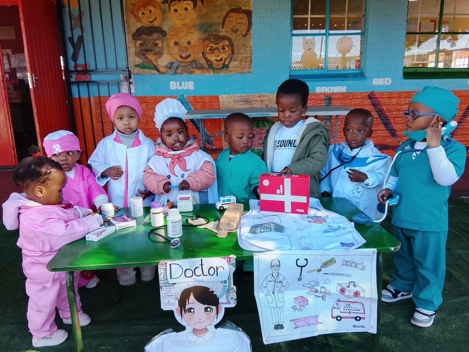 Matla learners dressed as doctors, nurses and chefs with a toy medical station on Career Day